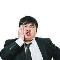 右の奥歯が痛すぎるスーツ姿の男性が頬に手を当てて困惑の写真