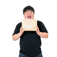 懸賞の小包が届いて心弾む男性が喜びを表現の写真