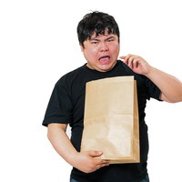 紙袋の荷物を持って焦る男性の受け取りと驚きの表情の写真