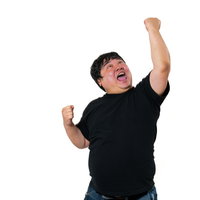 拳を高々と突き上げて雄叫びを上げる男性の写真