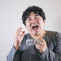 ホラーゲームをプレイ中に絶叫する系男子の恐怖顔の写真