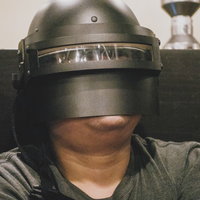 レベル3ヘルメットを装着した男性の正面写真の写真
