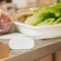 台所に置かれたダッシュボタンの写真