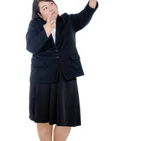 自分撮りする女性会社員の写真