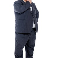 はち切れそうなストライプスーツを着て悩む膨よかな会社員男性の写真