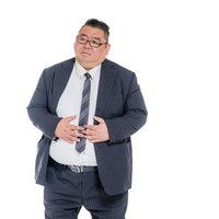 お腹を押さえる膨よかな男性スーツ姿の腹痛表現の写真