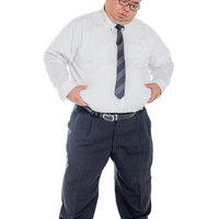 お腹に付いた脂肪を両手で抱える膨よかな男性会社員の写真