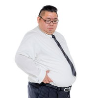 脇腹の贅肉を気にする膨よかな男性上司のメタボ体型の写真