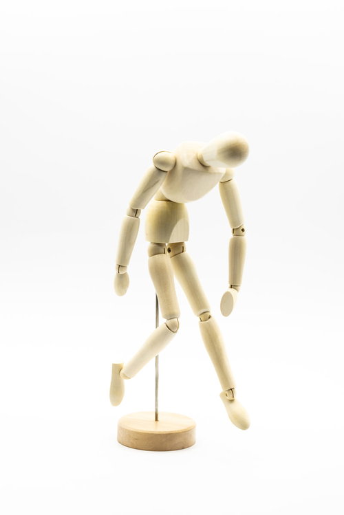 ぐったり落胆して肘をつくデッサン人形の疲労ポーズ