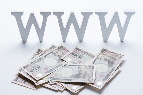 ネットビジネスで大儲けするイメージの札束とWWW