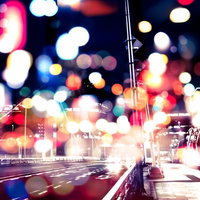 光あふれる夜の街並み（フォトモンタージュ）の写真