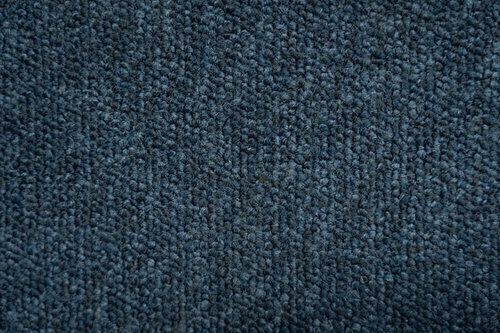 シミが残る青色タイルカーペットのテクスチャー