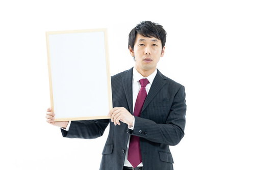 やる気がないホワイトボードでプレゼン営業マン