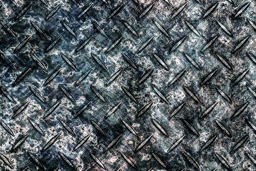 擦れたスチールの足場のテクスチャーパターン