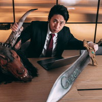 ソロで集会所クエストをクリアしたスーツ姿の会社員ハンターの写真