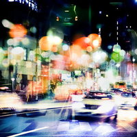 交通量が多い街の夜景（フォトモンタージュ）の写真