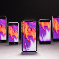 新旧iPhoneを同じ待受け画面に設定して並べたiPhone Xの写真