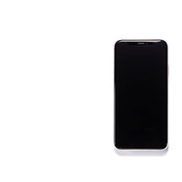 白背景に置かれた電源オフのiPhone Xの写真