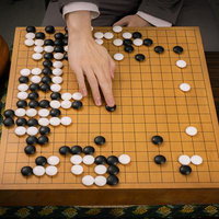 本因坊秀策の名手「赤耳の一手」を再現した囲碁の一局面の写真