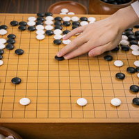 プロ棋士が示す赤耳の一手、本因坊秀策の局面の写真