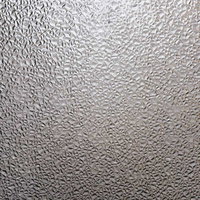 モザイク柄の擦りガラスの表面テクスチャーの写真