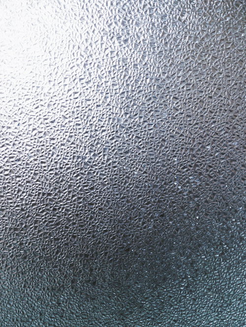 光が差し込む擦りガラスのテクスチャー