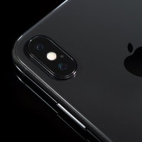 iPhone X のデュアルレンズカメラとAppleロゴの写真