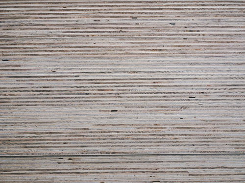 積み重なったベニヤ板の木目テクスチャと層状構造