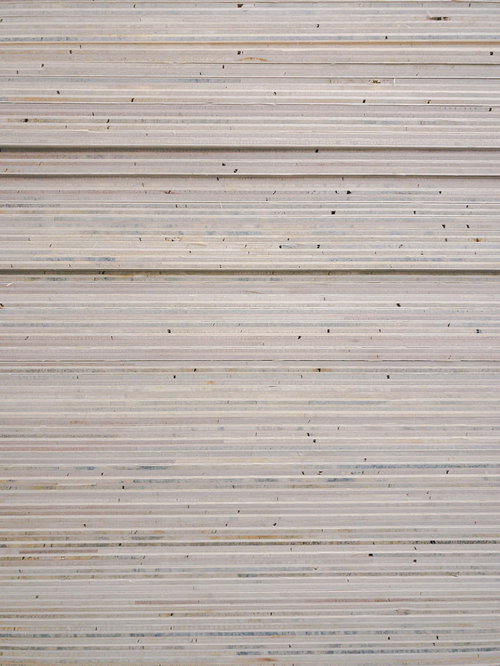 積まれた真新しいベニヤ板のテクスチャ