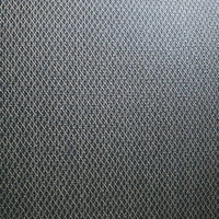 グレーの合皮生地を使用した椅子座面の高級テクスチャの写真