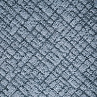 グレーの絨毯に織り込まれた幾何学模様のテクスチャーの写真