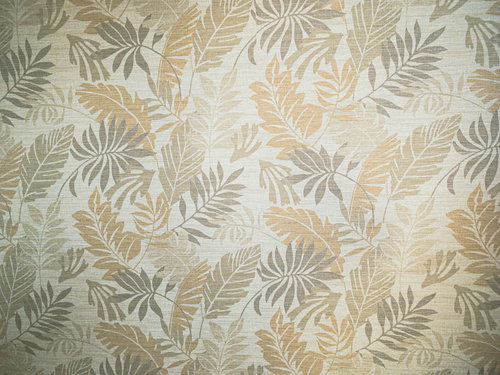 ベージュとグリーンのリーフ模様が描かれた壁紙