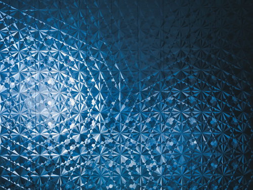 幾何学模様のフィルムを張ったガラス窓のテクスチャー