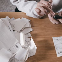 領収書のペーパーレス化に奮闘、スマートフォンで仕分けの写真