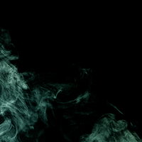 黒背景に舞い上がる緑色の不気味な煙とガスの写真