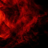 赤とオレンジに燃え上がる太陽フレアの炎と煙の写真