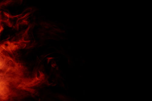 黒背景に立ち上がる赤い煙のテクスチャ