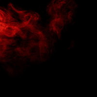 黒い背景に立ち上がる赤色の煙のスモークエフェクトの写真
