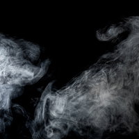 黒背景に立ち上る絶叫する煙 | 呪いと怨念の人型スモークの写真
