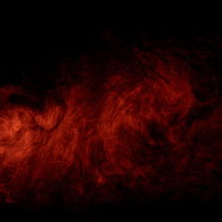 黒い背景に流れる赤い煙と炎のエフェクトの写真