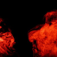 呪われた赤い煙と炎のエフェクト 黒背景ホラーゲームの写真