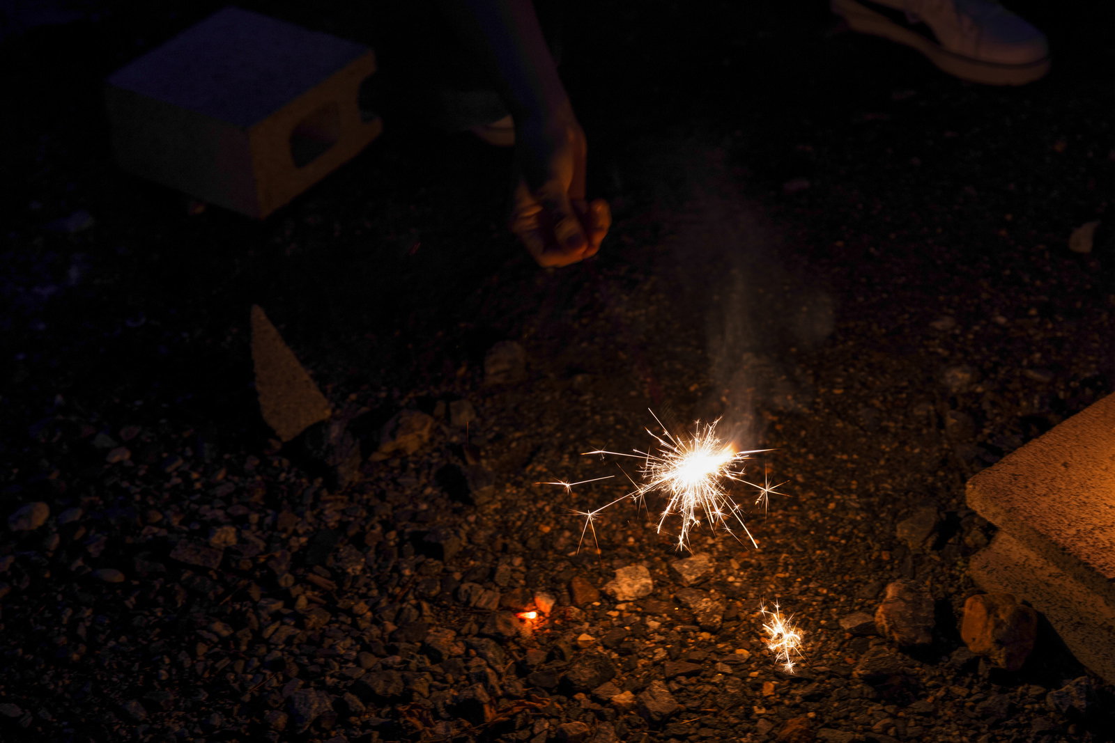 Handheld Fireworks at Night Free Stock Photo - PAKUTASO
