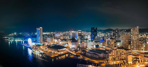 神戸ポートタワーからみた夜景と観覧車、港の夜間景観