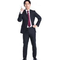 THE NO.1営業マン～指差しポーズで自信を表現の写真