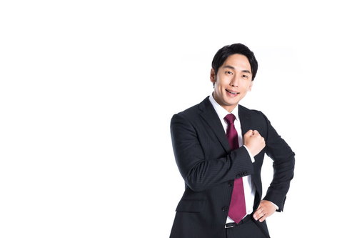 ご依頼はぜひ当社に！気合注入ポーズの男性ビジネスマン