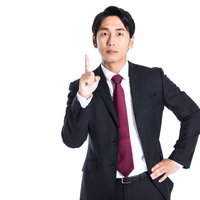 重要なポイントを人差し指で伝える情報商材屋の写真
