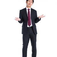 「ワカリマセ〜ン」ととぼける会社員の写真