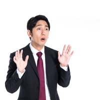 えっ！ 驚きを隠せない会社員の写真