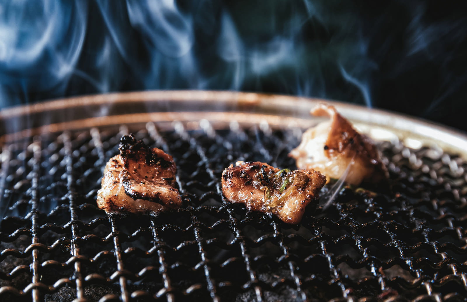 Offal charred and grilled over a charcoal fire