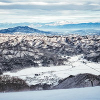 白馬五竜スキー場から見える雪化粧した北アルプスの山々の写真